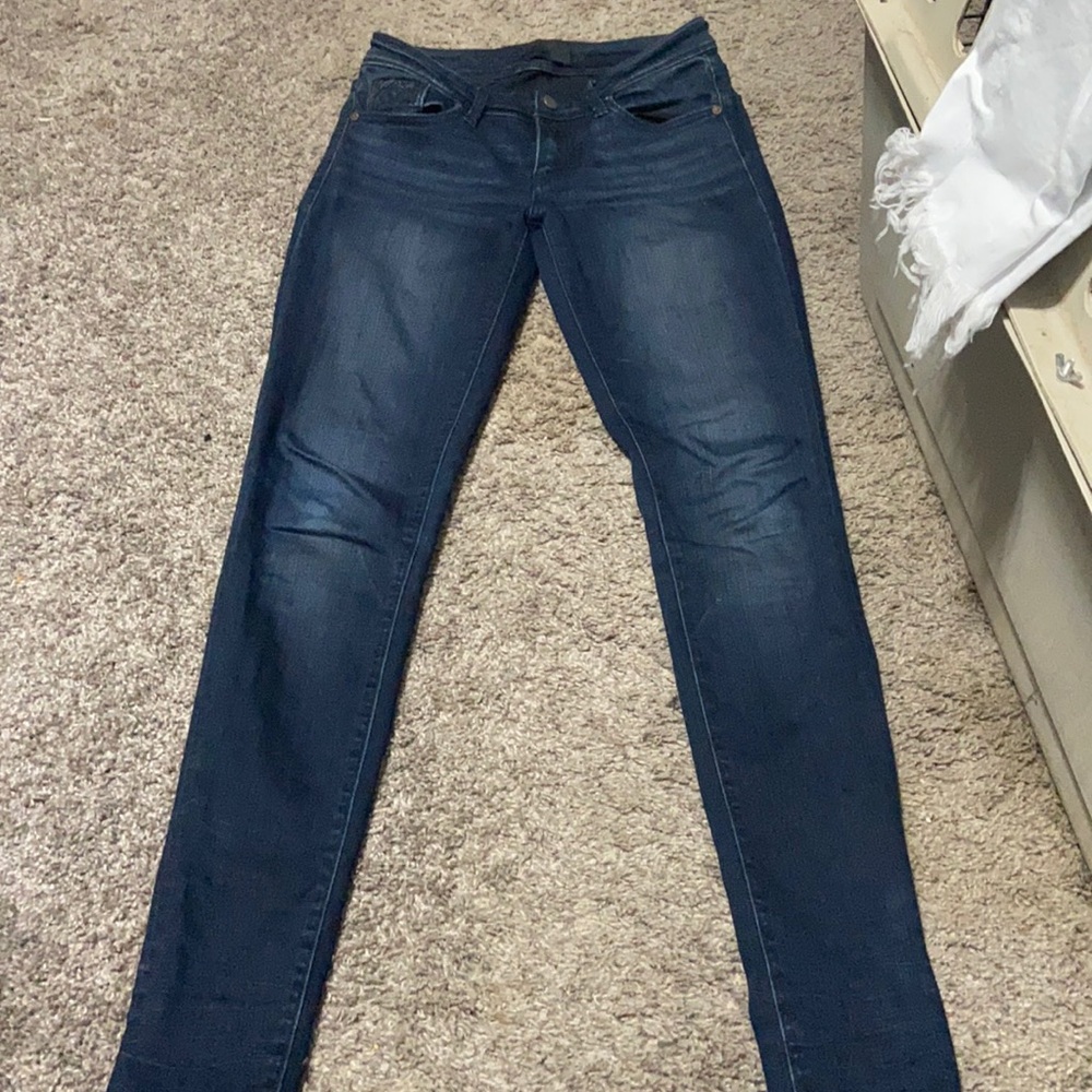 Buckle Black dark wash skinnies